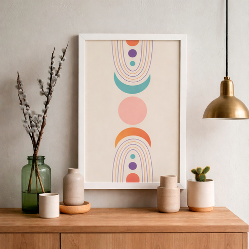 Decorative setup with a colorful abstract art print on a wall above a wooden surface with vases and a lamp.