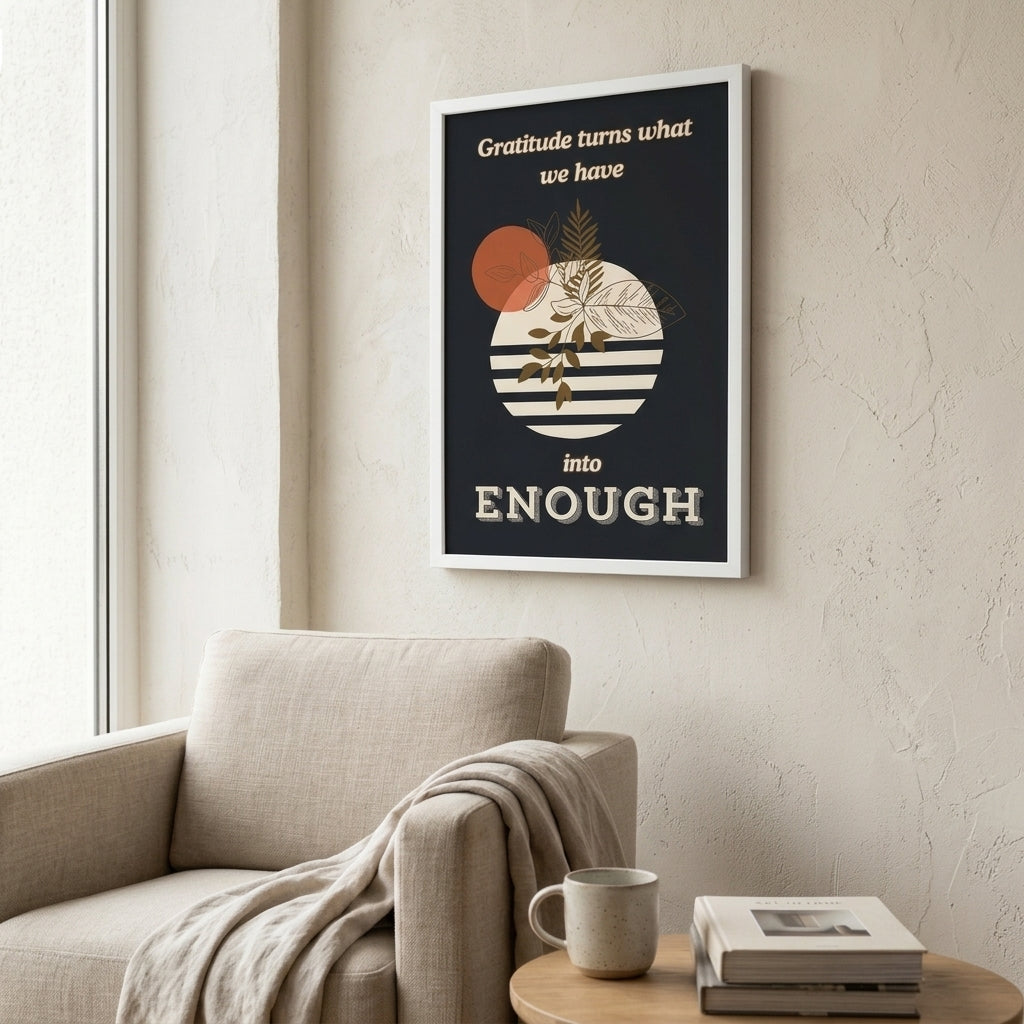 Framed motivational poster on a wall above a sofa with a cup and books on a table.