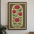 Decorative wall art with pink floral design on a white wall