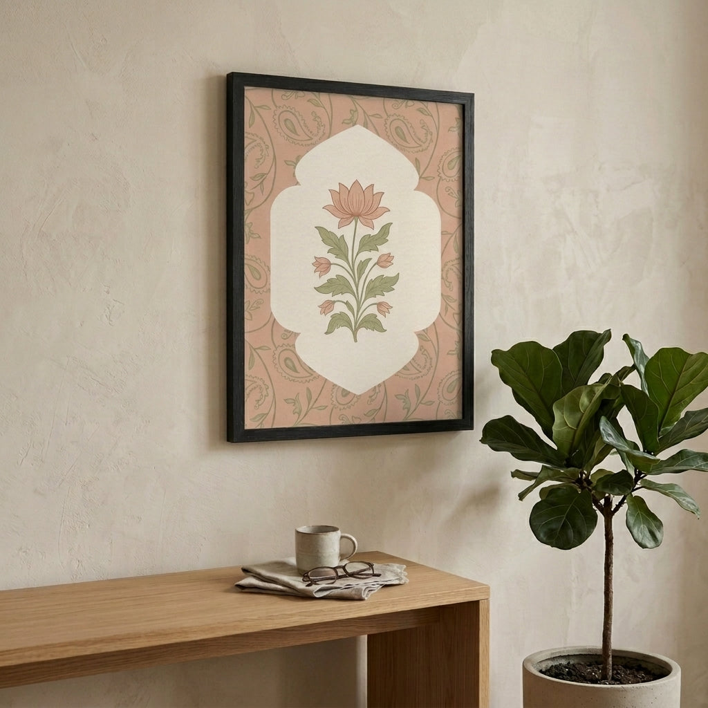 Framed floral artwork on a wall above a wooden table with a plant and mug.