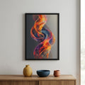 A framed abstract art print featuring a vibrant, flowing wave design in orange, yellow, purple, and blue tones, displayed on a light gray wall above a wooden console table with decorative ceramic vases.